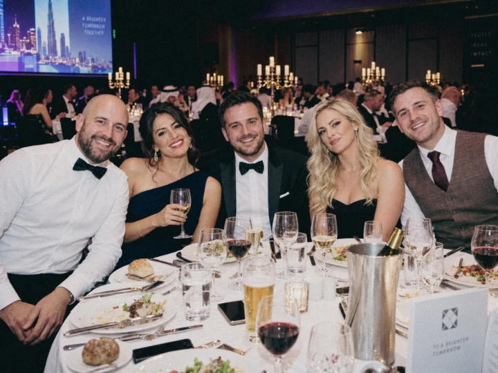 Guests seated at a formal gala dinner during professional corporate event photography coverage in Dubai and Abu Dhabi.